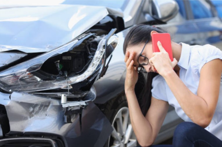Woman calling for help after car crash
